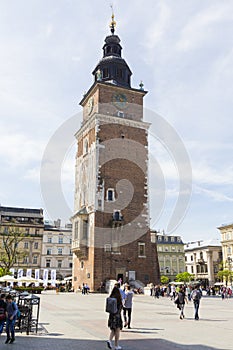 Tourists visiting Town Hall Tower and Rynek Glowny Square